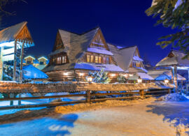 Wooden architecture of Zakopane at snowy night, Poland